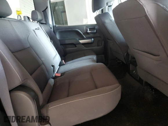 2018 Chevrolet Silverado 1500 LT with VIN 3GCUKREC2JG345482, listed as a Copart auction lot 52452445 with 100,824 mi miles and Salvage Title. Bid and sale history available at DreamBid. Image 10.