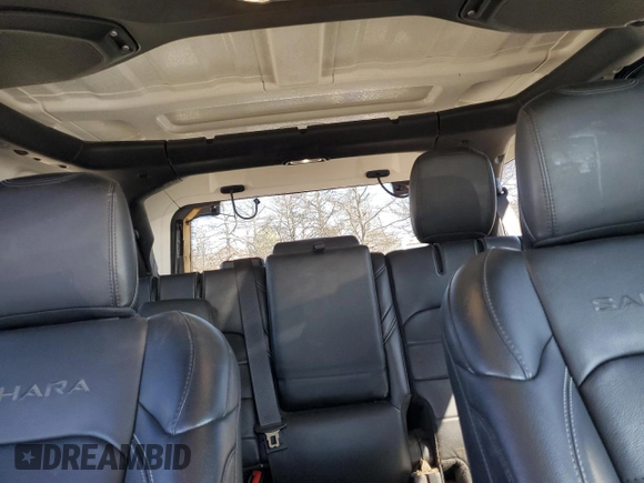 2023 Jeep Wrangler Sahara z VIN 1C4JJXP66PW605961, wystawiony jako Copart lot #50209655 z przebiegiem 32 805 mil mil oraz Szkoda całkowita • Salvage title. Historia ofert i sprzedaży dostępna na DreamBid. Obrazek 10.