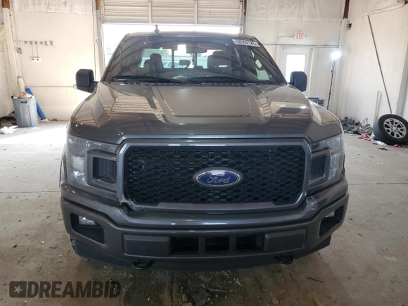 2020 Ford F-150 XL with VIN 1FTEW1E44LFC02735, listed as a Copart auction lot 62062125 with 111,471 mi miles and Salvage title. Bid and sale history available at DreamBid. Image 5.
