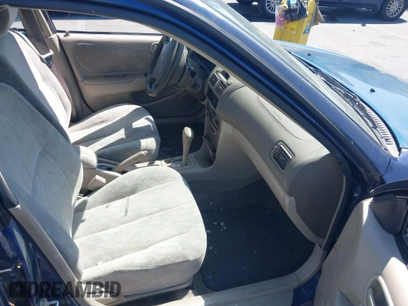 1998 Toyota Corolla VE z VIN 2T1BR18E4WC099280, wystawiony jako IAAI lot #42624278 z przebiegiem 129 901 mil mil oraz . Historia ofert i sprzedaży dostępna na DreamBid. Obrazek 5.