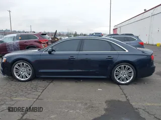 2017 Audi A8 L Sport with VIN WAU43AFD1HN007334, listed as a IAAI auction lot 41760035 with 67,342 mi miles. Bid and sale history available at carsss.com. Image 14.