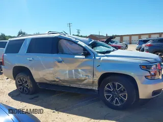 2020 Chevrolet Tahoe LT with VIN 1GNSKBKC5LR121085, listed as a IAAI auction lot 42341677 with 123,579 mi miles and . Bid and sale history available at DreamBid. Image 13.