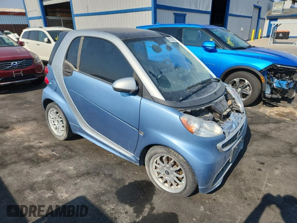 2013 Smart fortwo Passion with VIN WMEEJ9AA2DK722421, listed as a Copart auction lot 65154035 with 19,579 mi miles and Clean title. Bid and sale history available at DreamBid. Image 4.