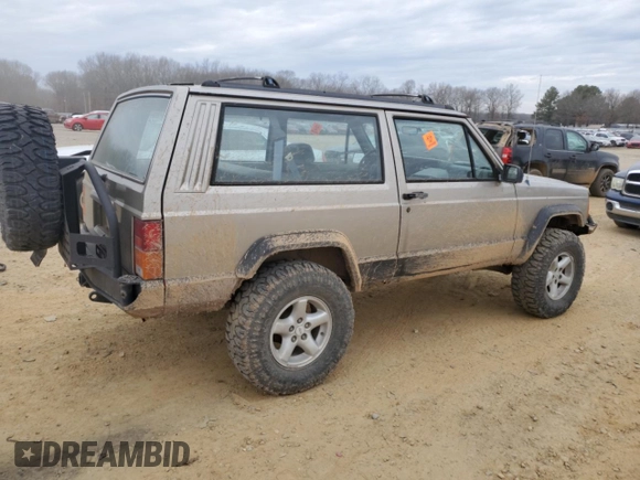 1993 Jeep Cherokee Sport with VIN 1J4FJ67S6PL580133, listed as a Copart auction lot 43230005 with 122,173 mi miles and Salvage Title. Bid and sale history available at carsss.com. Image 3.