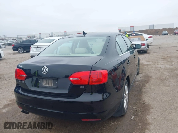 2014 Volkswagen Jetta Sedan SE w/Connectivity with VIN 3VWD07AJ4EM370905, listed as a IAAI auction lot 41472856 with 146,662 mi miles. Bid and sale history available at carsss.com. Image 4.