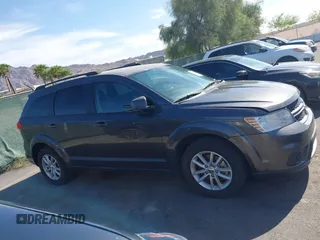 2017 Dodge Journey SXT with VIN 3C4PDCBBXHT506498, listed as a IAAI auction lot 42057667 with 110,059 mi miles and . Bid and sale history available at DreamBid. Image 13.