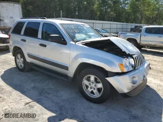 2005 Jeep Grand Cherokee Laredo with VIN 1J4HS48N65C543325, listed as a Copart auction lot 73710514 with 52,153 mi miles and Salvage Title. Bid and sale history available at carsss.com. Image 4.