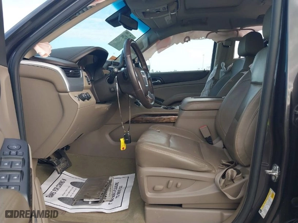 2016 GMC Yukon SLT with VIN 1GKS2BKC1GR406739, listed as a IAAI auction lot 41247286 with 106,023 mi miles. Bid and sale history available at carsss.com. Image 5.