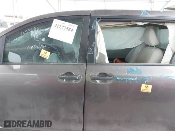 2014 Toyota Sienna L with VIN 5TDZK3DC5ES475204, listed as a IAAI auction lot 41277584 with 125,735 mi miles. Bid and sale history available at carsss.com. Image 13.