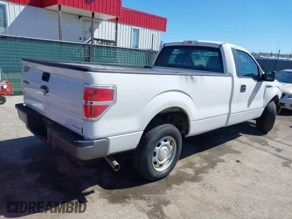 2014 Ford F-150 XL with VIN 1FTMF1CM1EKE41667, listed as a IAAI auction lot 41847599 with 31,671 mi miles and . Bid and sale history available at DreamBid. Image 4.