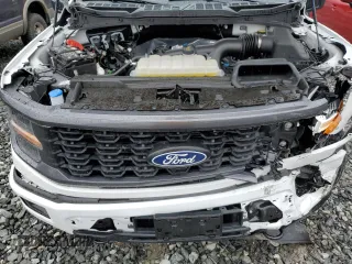 2024 Ford F-150 STX with VIN 1FTEW2LP0RKD27766, listed as a Copart auction lot 52286875 with 9,880 mi miles and Salvage Title. Bid and sale history available at carsss.com. Image 11.
