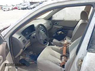 2003 Mazda Protege DX with VIN JM1BJ225730146488, listed as a IAAI auction lot 42086747 with Not Provided miles and . Bid and sale history available at DreamBid. Image 5.