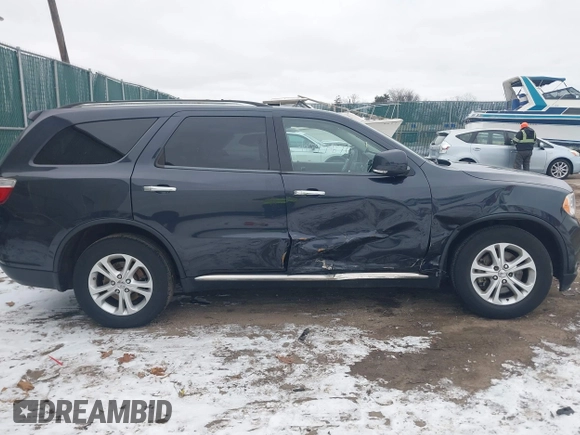 2013 Dodge Durango Crew z VIN 1C4SDJDT7DC684766, wystawiony jako IAAI lot #41277670 z przebiegiem 115 555 mil mil oraz . Historia ofert i sprzedaży dostępna na DreamBid. Obrazek 13.