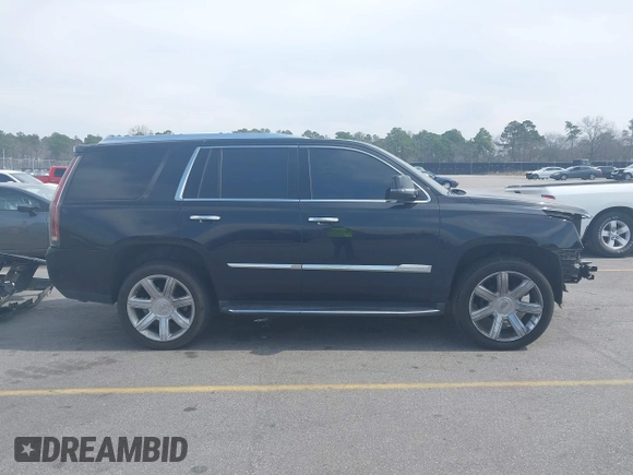2017 Cadillac Escalade Luxury z VIN 1GYS4BKJ3HR307534, wystawiony jako IAAI lot #41762802 z przebiegiem 109 420 mil mil oraz . Historia ofert i sprzedaży dostępna na DreamBid. Obrazek 14.