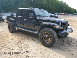 2021 Jeep Gladiator High Altitude with VIN 1C6HJTFGXML570864, listed as a Copart auction lot 56964975 with 67,538 mi miles and Salvage title. Bid and sale history available at DreamBid. Image 4.
