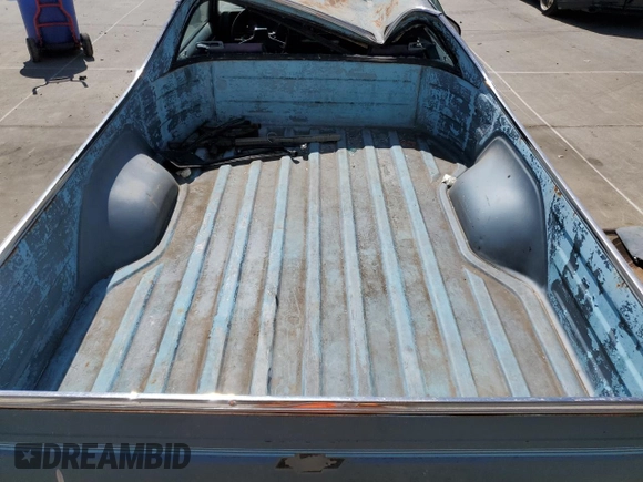 1987 Chevrolet El Camino SS z VIN 3GCCW80H4HS912151, wystawiony jako Copart lot #52302005 z przebiegiem 54 489 mil mil oraz Szkoda całkowita • Salvage title. Historia ofert i sprzedaży dostępna na DreamBid. Obrazek 10.