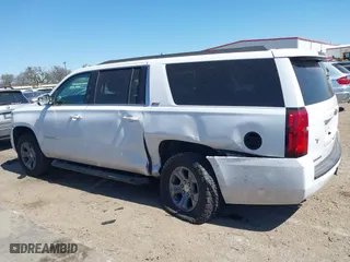 2019 Chevrolet Suburban LT with VIN 1GNSKHKC2KR297254, listed as a IAAI auction lot 41765492 with 63,058 mi miles. Bid and sale history available at carsss.com. Image 14.