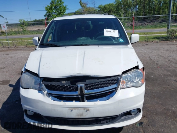 2018 Dodge Grand Caravan SXT with VIN 2C4RDGCG1JR326457, listed as a IAAI auction lot 42047301 with 84,518 mi miles and . Bid and sale history available at DreamBid. Image 12.