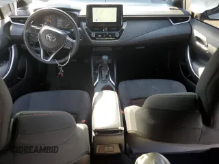 2023 Toyota Corolla SE with VIN JTDS4MCE6PJ101477, listed as a Copart auction lot 49425025 with 35,948 mi miles and Salvage Title. Bid and sale history available at DreamBid. Image 8.
