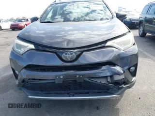 2016 Toyota RAV4 SE with VIN JTMJFREV8GJ087419, listed as a IAAI auction lot 41680315 with 93,298 mi miles and . Bid and sale history available at DreamBid. Image 6.