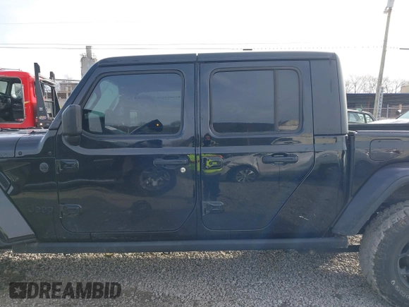 2023 Jeep Gladiator Sport S z VIN 1C6HJTAG7PL567903, wystawiony jako IAAI lot #41574387 z przebiegiem 49 378 mil mil oraz . Historia ofert i sprzedaży dostępna na DreamBid. Obrazek 14.