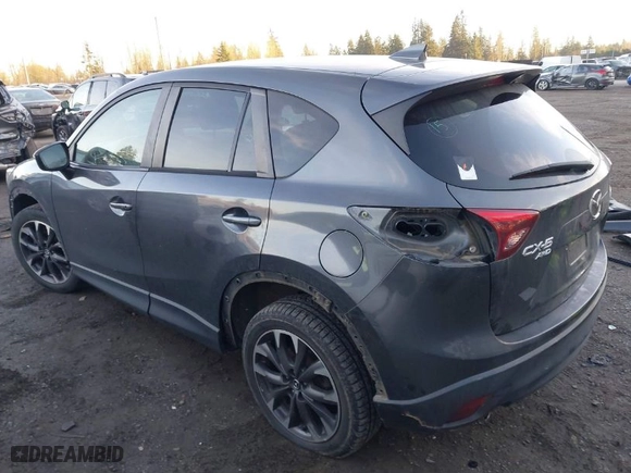 2016 Mazda CX-5 Grand Touring with VIN JM3KE4DY3G0817899, listed as a IAAI auction lot 41287459 with NaN miles. Bid and sale history available at carsss.com. Image 3.