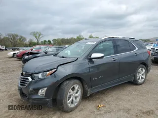 2020 Chevrolet Equinox Premier z VIN 2GNAXNEV4L6169880, wystawiony jako Copart lot #55346505 z przebiegiem 80 222 mil mil oraz Szkoda całkowita • Salvage title. Historia ofert i sprzedaży dostępna na DreamBid. Obrazek 1.