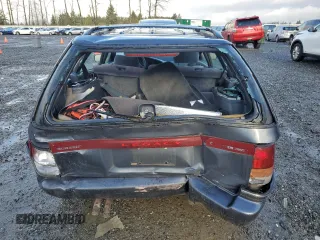 1993 Subaru Legacy L with VIN 4S3BJ6331P7949959, listed as a Copart auction lot 88360485 with 125,562 mi miles and Salvage Title. Bid and sale history available at DreamBid. Image 6.