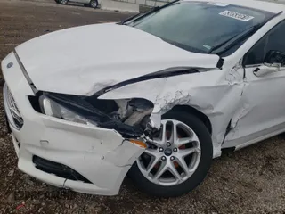 2014 Ford Fusion SE with VIN 1FA6P0H75E5379472, listed as a Copart auction lot 63853861 with 180,086 mi miles and Salvage Title. Bid and sale history available at carsss.com. Image 9.