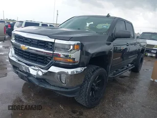 2016 Chevrolet Silverado 1500 LT with VIN 1GCVKREH3GZ233606, listed as a IAAI auction lot 42111728 with 90,449 mi miles and . Bid and sale history available at DreamBid. Image 2.