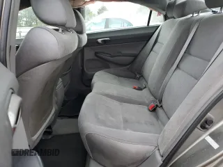 2006 Honda Civic LX z VIN 1HGFA16586L132710, wystawiony jako Copart lot #55261865 z przebiegiem 143 679 mil mil oraz Szkoda całkowita • Salvage title. Historia ofert i sprzedaży dostępna na DreamBid. Obrazek 10.