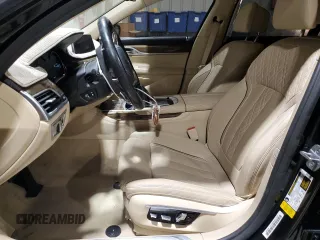 2017 BMW 7 Series 740i with VIN WBA7E2C3XHG741046, listed as a Copart auction lot 45382705 with 99,065 mi miles and Salvage Title. Bid and sale history available at carsss.com. Image 7.