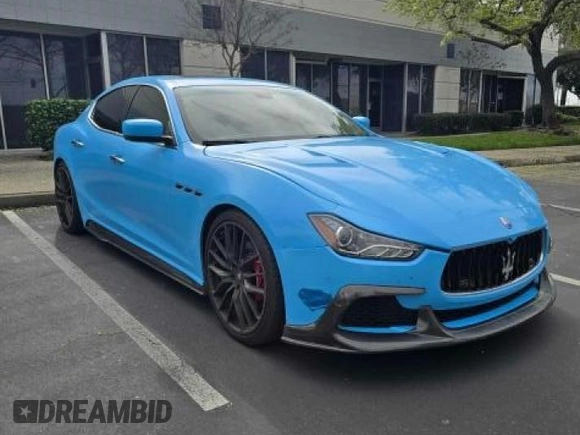 2014 Maserati Ghibli S Q4 z VIN ZAM57RTA7E1089301, wystawiony jako Copart lot #54070585 z przebiegiem 59 787 mil mil oraz Szkoda całkowita • Salvage title. Historia ofert i sprzedaży dostępna na DreamBid. Obrazek 1.