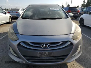 2013 Hyundai Elantra GT with VIN KMHD35LE2DU098164, listed as a Copart auction lot 77272174 with 165,061 mi miles and Salvage Title. Bid and sale history available at carsss.com. Image 5.