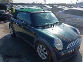 2006 MINI Convertible with VIN WMWRF33566TG15710, listed as a IAAI auction lot 41636955 with Not Provided miles and . Bid and sale history available at DreamBid. Image 6.