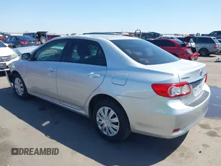 2011 Toyota Corolla L with VIN JTDBU4EE0B9151332, listed as a IAAI auction lot 41970433 with 113,157 mi miles. Bid and sale history available at carsss.com. Image 3.