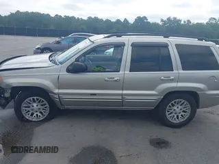 2004 Jeep Grand Cherokee Limited with VIN 1J4GX58SX4C255363, listed as a IAAI auction lot 42619798 with 239,475 mi miles and . Bid and sale history available at DreamBid. Image 14.