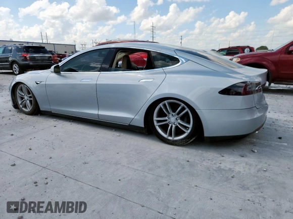 2013 Tesla Model S with VIN 5YJSA1CG5DFP03704, listed as a Copart auction lot 65143565 with Not provided miles and Clean title. Bid and sale history available at DreamBid. Image 2.