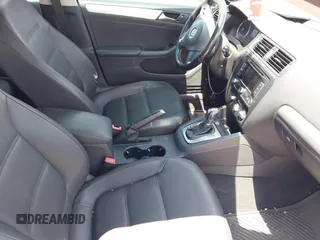 2012 Volkswagen Jetta TDI w/Premium with VIN 3VWLL7AJ1CM307485, listed as a IAAI auction lot 42384300 with 118,958 mi miles and . Bid and sale history available at DreamBid. Image 5.