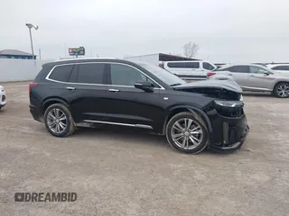 2023 Cadillac XT6 FWD Premium Luxury with VIN 1GYKPCRS8PZ231089, listed as a IAAI auction lot 41500954 with 36,455 mi miles and . Bid and sale history available at DreamBid. Image 13.