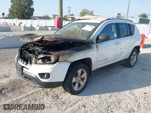 2014 Jeep Compass Sport with VIN 1C4NJDBB3ED892141, listed as a IAAI auction lot 40572980 with 95,826 mi miles. Bid and sale history available at carsss.com. Image 2.