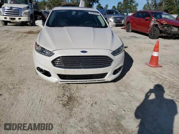 2013 Ford Fusion Titanium Hybrid with VIN 3FA6P0RU2DR277773, listed as a Copart auction lot 85990424 with 215,289 mi miles and Non Repairable. Bid and sale history available at DreamBid. Image 5.