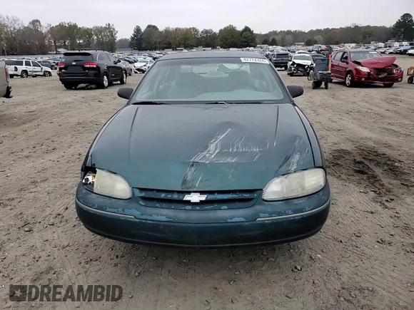1997 Chevrolet Lumina LS with VIN 2G1WL52M3V9163567, listed as a Copart auction lot 82772324 with 191,852 mi miles and Salvage Title. Bid and sale history available at DreamBid. Image 11.