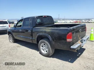 2001 Dodge Dakota Sport z VIN 1B7HG2AN61S316996, wystawiony jako Copart lot #58677535 z przebiegiem 164 628 mil mil oraz Tytuł czysty. Historia ofert i sprzedaży dostępna na DreamBid. Obrazek 2.