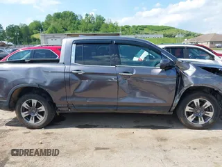 2018 Honda Ridgeline RTL-E with VIN 5FPYK3F74JB004162, listed as a IAAI auction lot 42180687 with 160,805 mi miles and . Bid and sale history available at DreamBid. Image 14.
