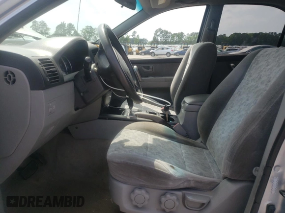 2007 Kia Sorento LX z VIN KNDJD736475691337, wystawiony jako Copart lot #57889615 z przebiegiem 279 716 mil mil oraz Szkoda całkowita • Salvage title. Historia ofert i sprzedaży dostępna na DreamBid. Obrazek 7.