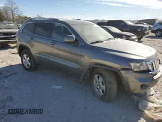2012 Jeep Grand Cherokee Laredo with VIN 1C4RJEAG0CC299568, listed as a Copart auction lot 80455464 with 98,540 mi miles and Salvage Title. Bid and sale history available at carsss.com. Image 4.
