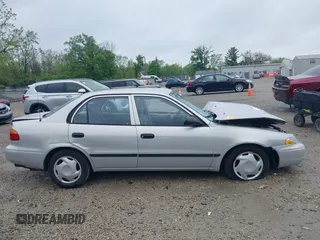 2001 Chevrolet Prizm z VIN 1Y1SK52851Z423703, wystawiony jako IAAI lot #42169702 z przebiegiem Nie podano mil oraz . Historia ofert i sprzedaży dostępna na DreamBid. Obrazek 14.