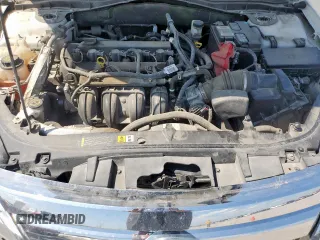 2012 Ford Fusion SE z VIN 3FAHP0HA9CR395558, wystawiony jako Copart lot #58925035 z przebiegiem 126 089 mil mil oraz Szkoda całkowita • Salvage title. Historia ofert i sprzedaży dostępna na DreamBid. Obrazek 11.