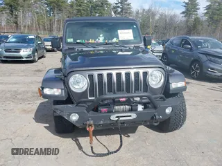 2018 Jeep Wrangler Unlimited Sahara with VIN 1C4HJXEG0JW246110, listed as a IAAI auction lot 41826662 with 65,236 mi miles. Bid and sale history available at carsss.com. Image 12.